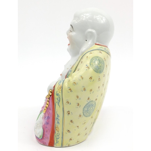 827 - Chinese porcelain figure of Buddha, impressed character marks to the base, 20.5cm high