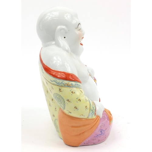 827 - Chinese porcelain figure of Buddha, impressed character marks to the base, 20.5cm high