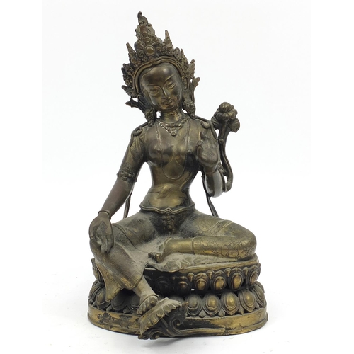 102 - Chino-Tibetan patinated bronze figure of seated Buddha, 32cm high