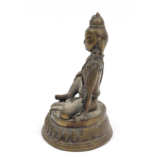 191 - Chino-Tibetan patinated bronze figure of a seated buddha, 19.5cm high