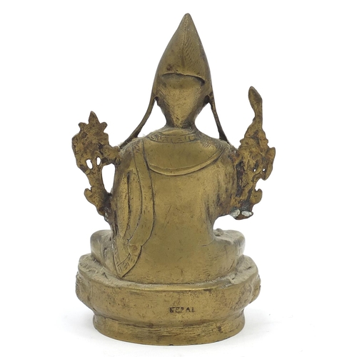 192 - Chino-Tibetan patinated bronze figure of seated Buddha, 16cm high