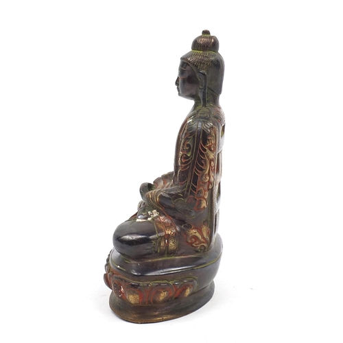 666 - Chino-Tibetan patinated bronze figure of seated Buddha, 19.5cm high