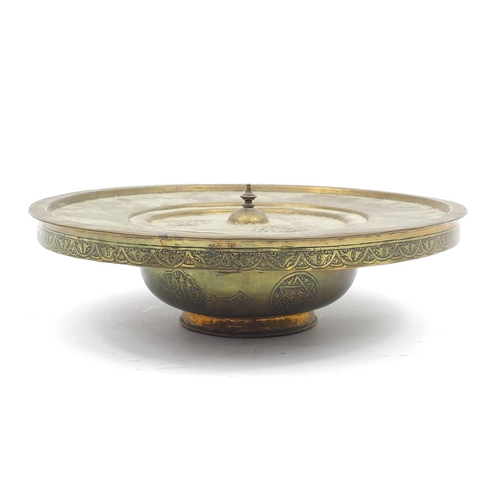 58 - Islamic Cairoware brass incense stand with pierced lid engraved with calligraphy, 9cm high x 32cm in... 