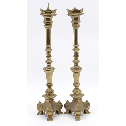 581 - Large pair of classical brass candlesticks, each 59cm high