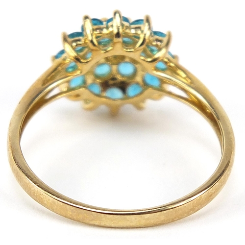 1086 - 9ct gold blue stone three tier cluster ring, size U, 3.0g