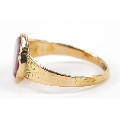 117 - Victorian 18ct gold hardstone signet ring with engraved shoulders, London 1864, size J, 1.7g