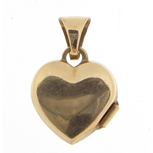 1148 - 9ct gold love heart locket, 1.4cm high, 0.6g