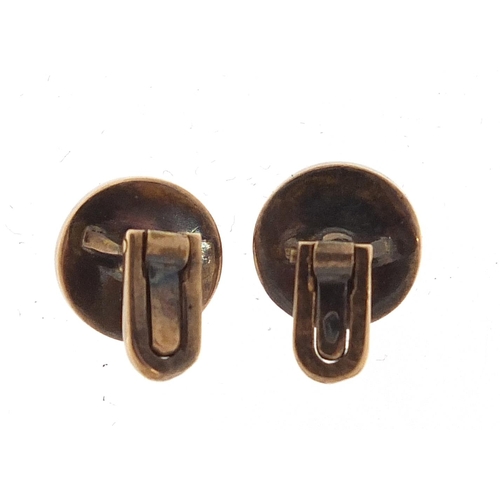 203 - Pair of Continental gold, diamond and mother of pearl gentlemen's dress studs, housed in a velvet an... 