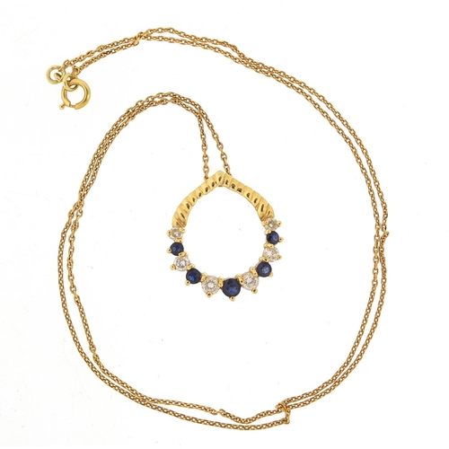 213 - 18ct gold sapphire and diamond pendant on a gold coloured metal necklace, the pendant 1.6cm high, to... 