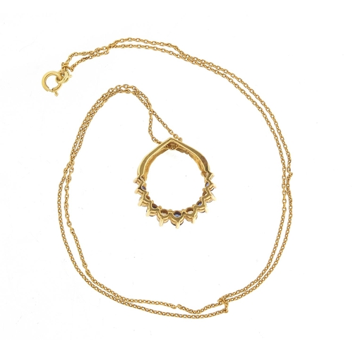 213 - 18ct gold sapphire and diamond pendant on a gold coloured metal necklace, the pendant 1.6cm high, to... 