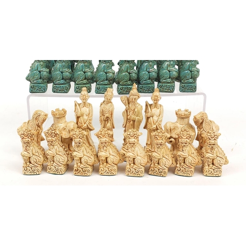 1242 - Chinese design ivorine and turquoise colour chess set, the largest pieces each 12.5cm high