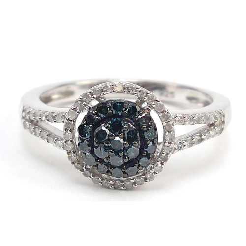 540 - Silver blue and white diamond cluster ring, size O, 2.9g