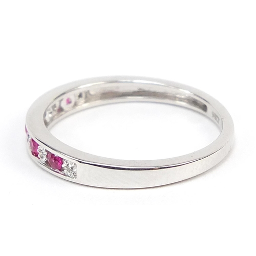 680 - 9ct white gold ruby and diamond half eternity ring, size L/M, 1.7g