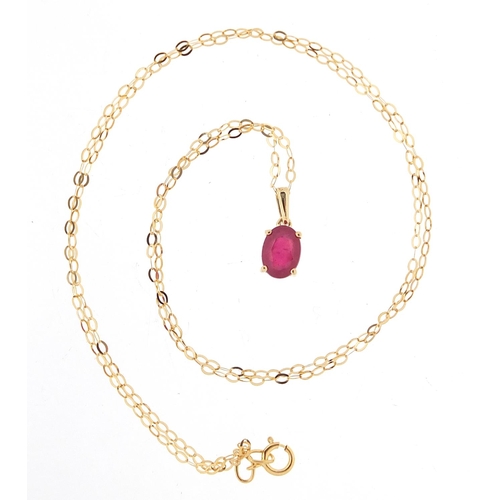 539 - 9ct gold ruby pendant on a 9ct gold necklace, 1.2cm high and 46cm in length, total 1.0g