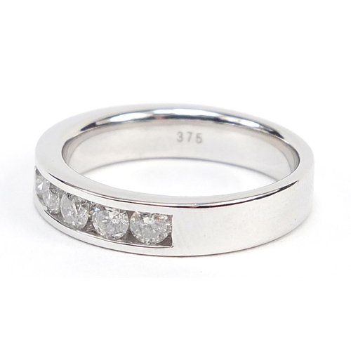 1083 - 9ct white gold diamond half eternity ring, approximately 1.09 carat, size N, 4.0g