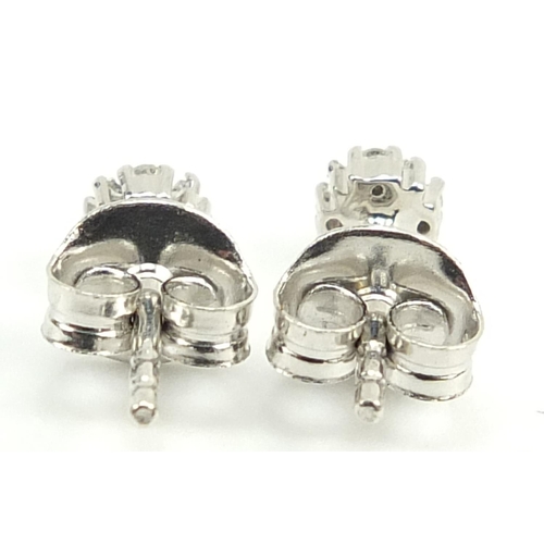 1082 - Pair of 9ct white gold diamond cluster stud earrings, 4.2mm in diameter, 0.8g