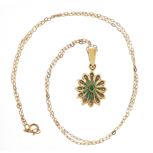 173 - Large 9ct gold emerald and diamond cluster pendant on a 9ct gold necklace, the pendant 2.5cm high, t... 