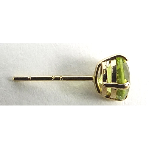 788 - Pair of 9ct gold peridot solitaire stud earrings, 5mm in diameter, 0.6g