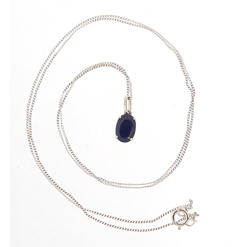 372 - Unmarked white gold sapphire pendant on a 9ct white gold necklace, 1.1cm high and 44cm in length, to... 