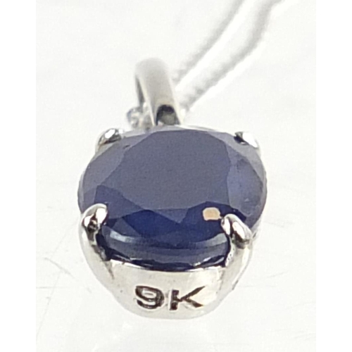 372 - Unmarked white gold sapphire pendant on a 9ct white gold necklace, 1.1cm high and 44cm in length, to... 