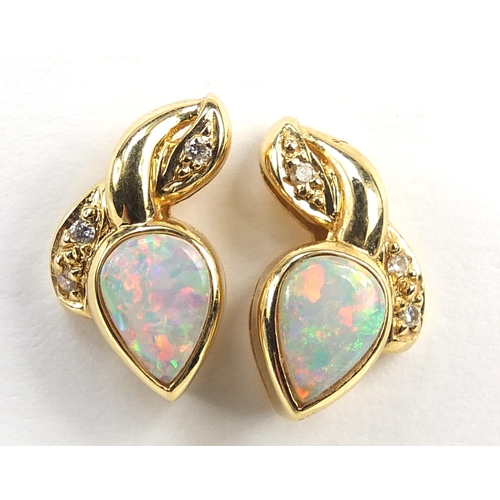 118 - Pair of 18ct gold opal and diamond stud earrings, 14mm high, 3.4g