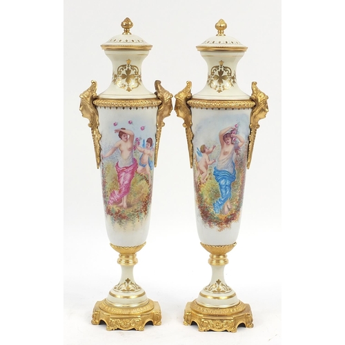 907 - Large pair of French porcelain vases and covers with gilt bronze mounts in the style of Sevres, each... 