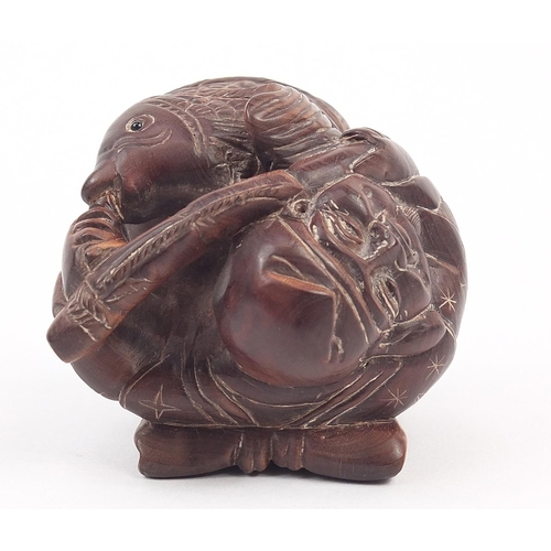 234 - Japanese carved wood netsuke of a fisherman, inset mother of pearl plaque with character marks to th... 