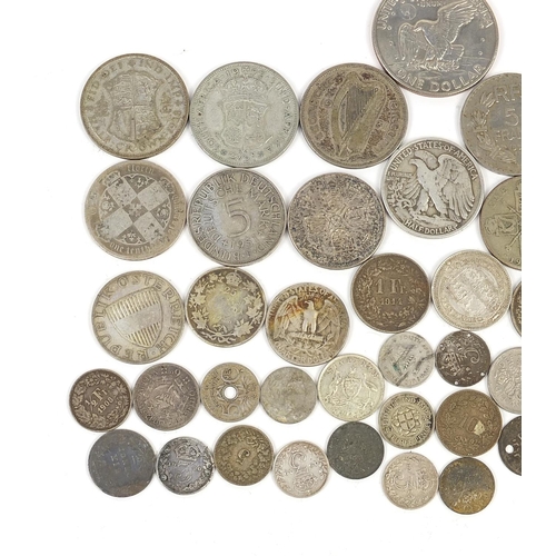 879 - Antique and later British and world coinage, some silver including 1893 half crown and 1936 half dol... 