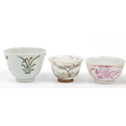 920 - Four Chinese porcelain tea bowls and a Japanese Kutani example, the largest 6cm high