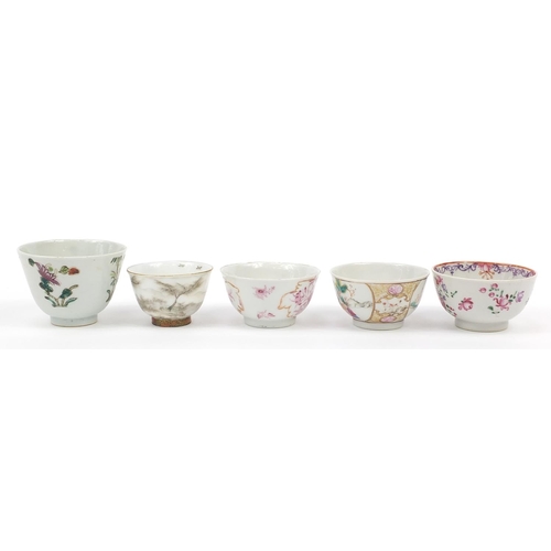 920 - Four Chinese porcelain tea bowls and a Japanese Kutani example, the largest 6cm high