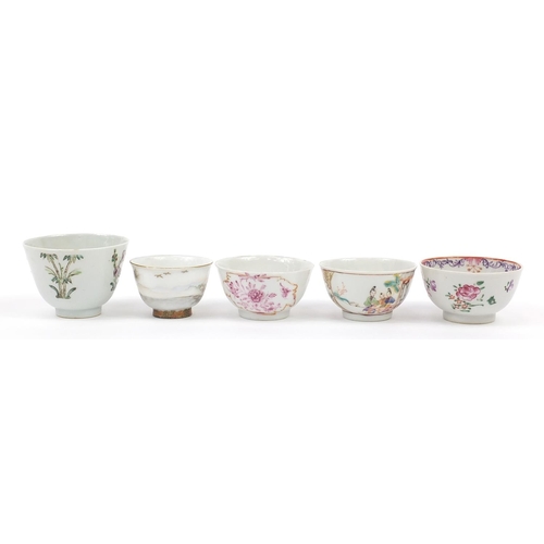 920 - Four Chinese porcelain tea bowls and a Japanese Kutani example, the largest 6cm high