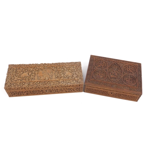 440 - Two Anglo-Indian sandalwood boxes finely and profusely carved with deities and wild animals amongst ... 