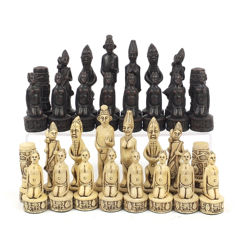 1246A - African design bronzed and ivorine chess set, the largest pieces each 15.5cm high