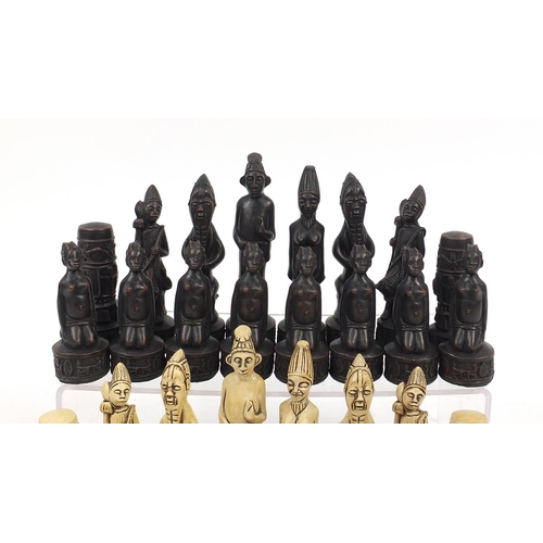 1246A - African design bronzed and ivorine chess set, the largest pieces each 15.5cm high