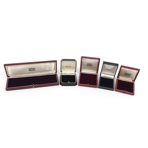 904 - Five Harrods tooled leather jewellery boxes, the largest 22.5cm wide