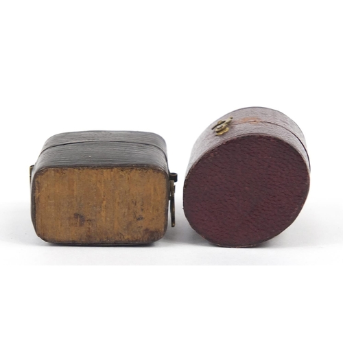 888 - Two Georgian leather, velvet and silk lined ring boxes including Hanhart & Co, the largest 3cm high