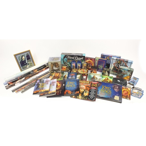 1772 - Collection of Lord of the Rings collectables including card games, Collector's DVD gift set, tee shi... 