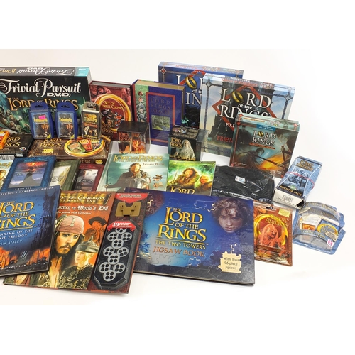 1772 - Collection of Lord of the Rings collectables including card games, Collector's DVD gift set, tee shi... 