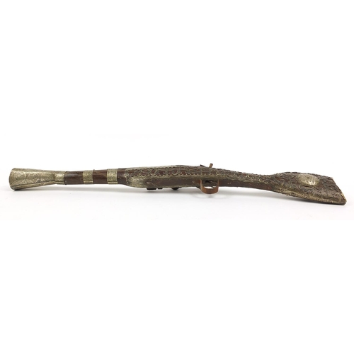 1187 - Decorative blunderbuss with engraved silver coloured metal mounts, 68cm in length