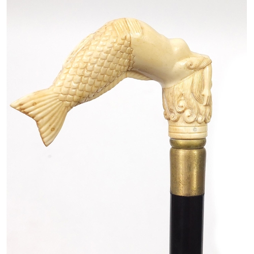 1132 - Hardwood walking stick with carved bone mermaid design handle, 93.5cm in length