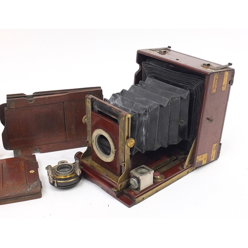 1160 - Victorian mahogany plate camera with plates and Beck symmetrical lens, the camera 17cm high