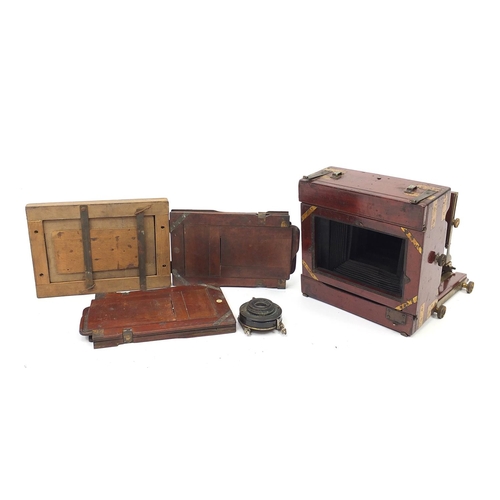 1160 - Victorian mahogany plate camera with plates and Beck symmetrical lens, the camera 17cm high