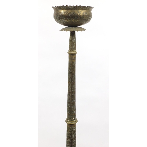 65 - Islamic floor standing incense burner/lamp profusely embossed with deities, 182cm high