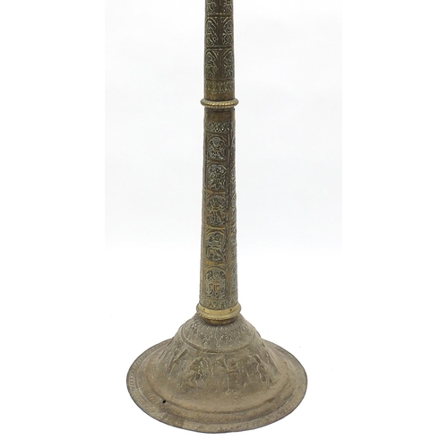 65 - Islamic floor standing incense burner/lamp profusely embossed with deities, 182cm high