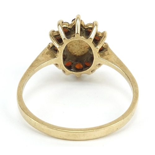 793 - 9ct gold opal and garnet ring, size S, 2.4g