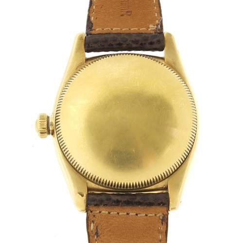 77 - Rolex, 14ct gold Oyster perpetual wristwatch with bubbleback, the movement numbered 52403, the case ... 