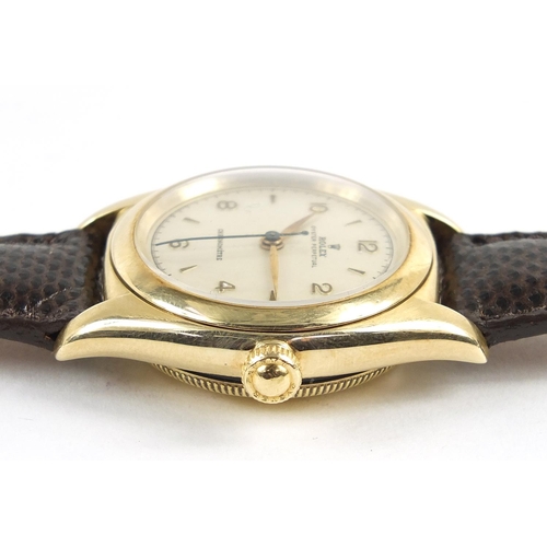 77 - Rolex, 14ct gold Oyster perpetual wristwatch with bubbleback, the movement numbered 52403, the case ... 