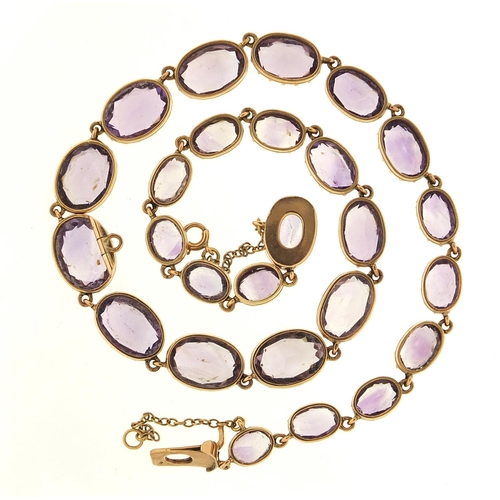 205 - Antique unmarked gold graduated amethyst necklace, 34cm in length, 29.4g