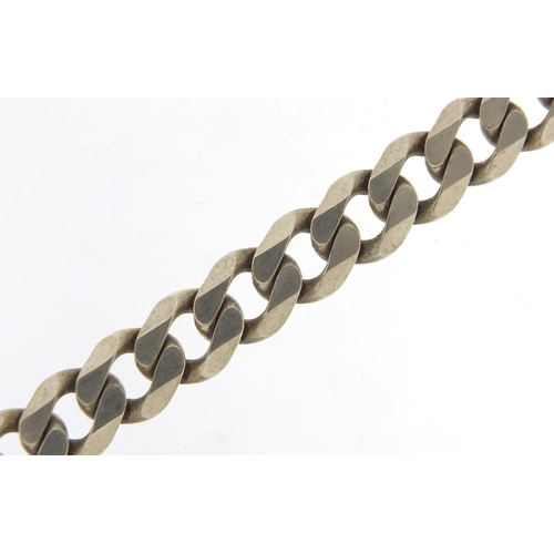 544 - Silver curb link bracelet, 22cm in length, 34.2g