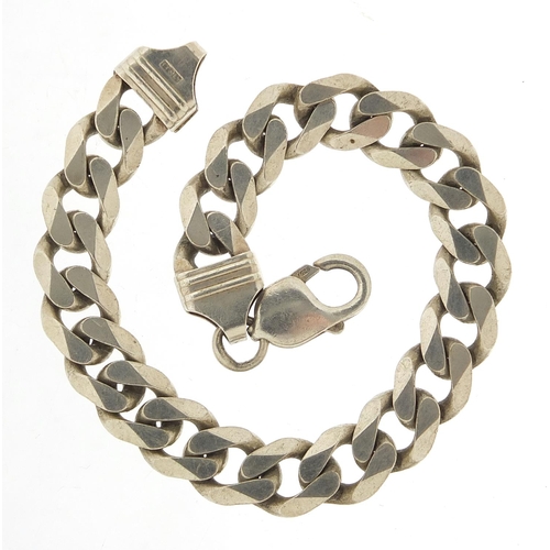 544 - Silver curb link bracelet, 22cm in length, 34.2g